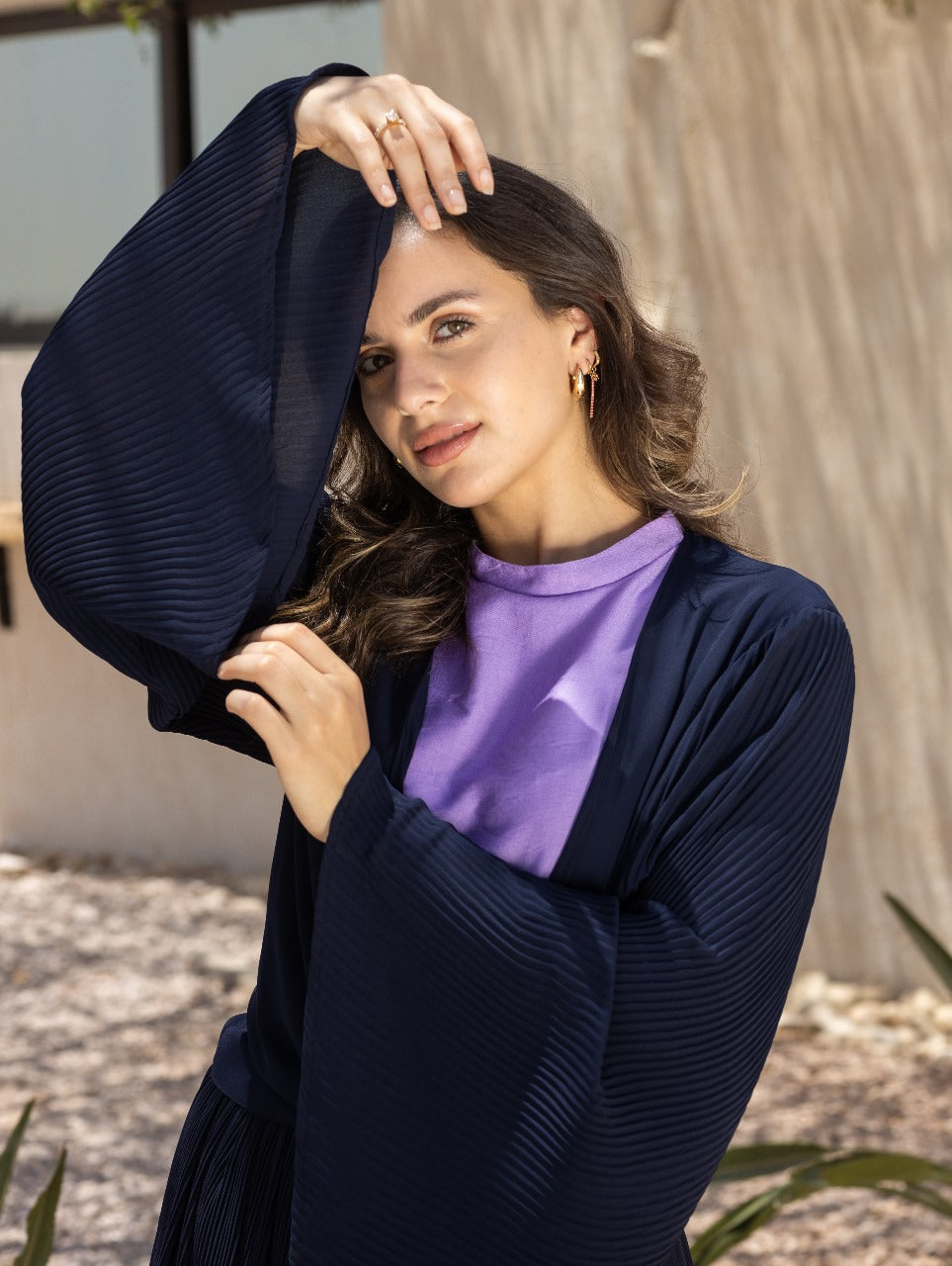 NAVY PLISSE WRAP BLOUSE